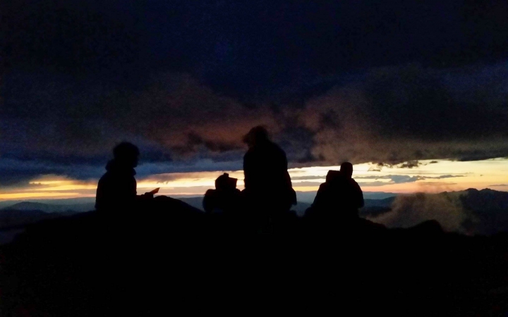 the silhouettes of students on a mountaineering course with outward bound 